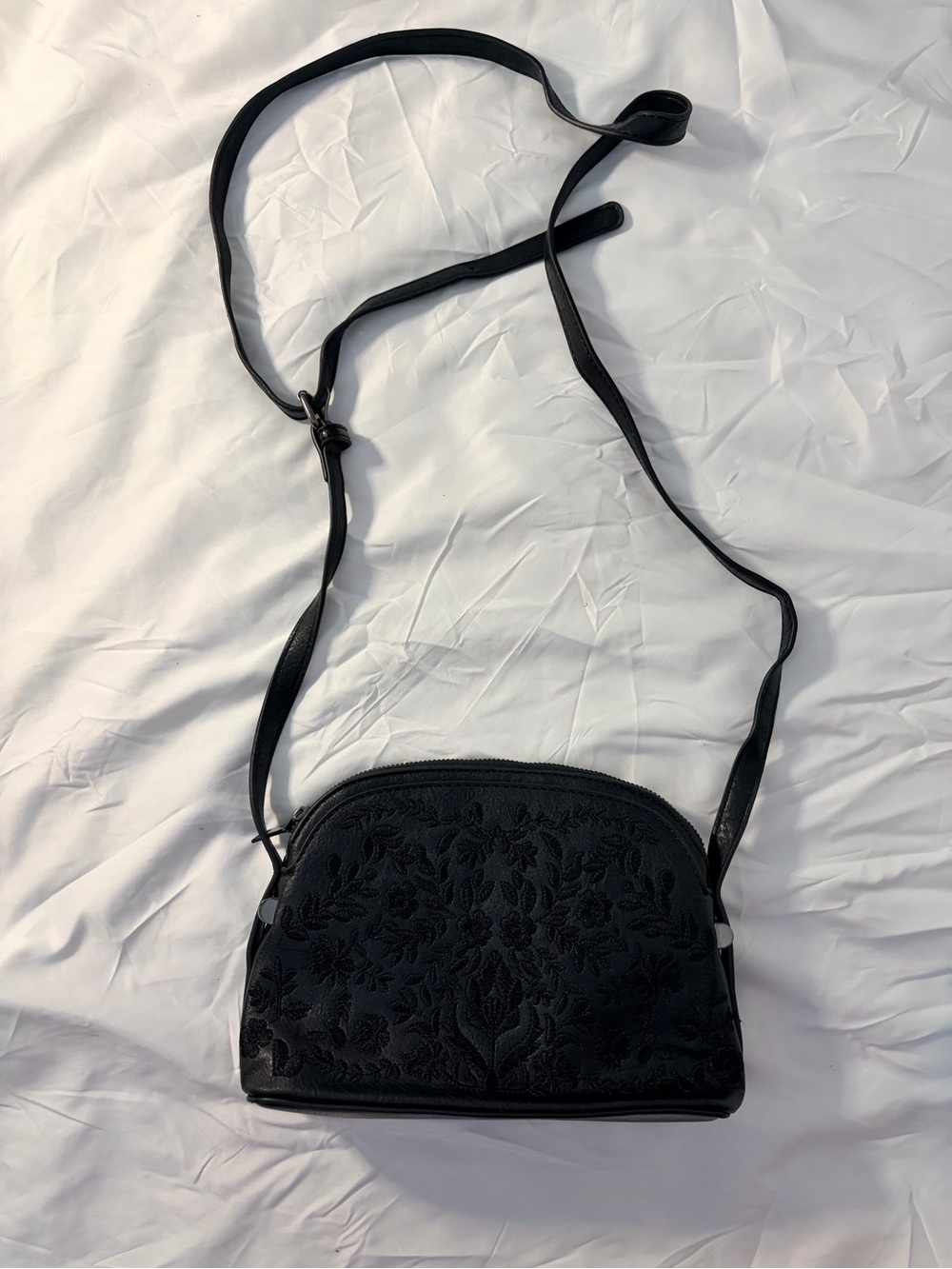 Sam & Hadley Embossed
Floral Dome Crossbody bag